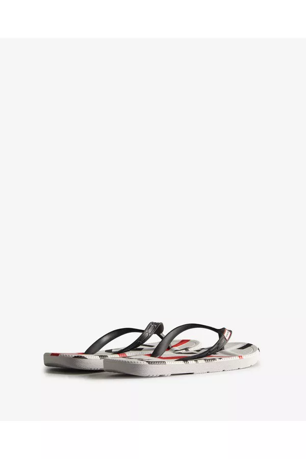 Women's Exploded Logo Flip Flops by Hunter at THE MILE
