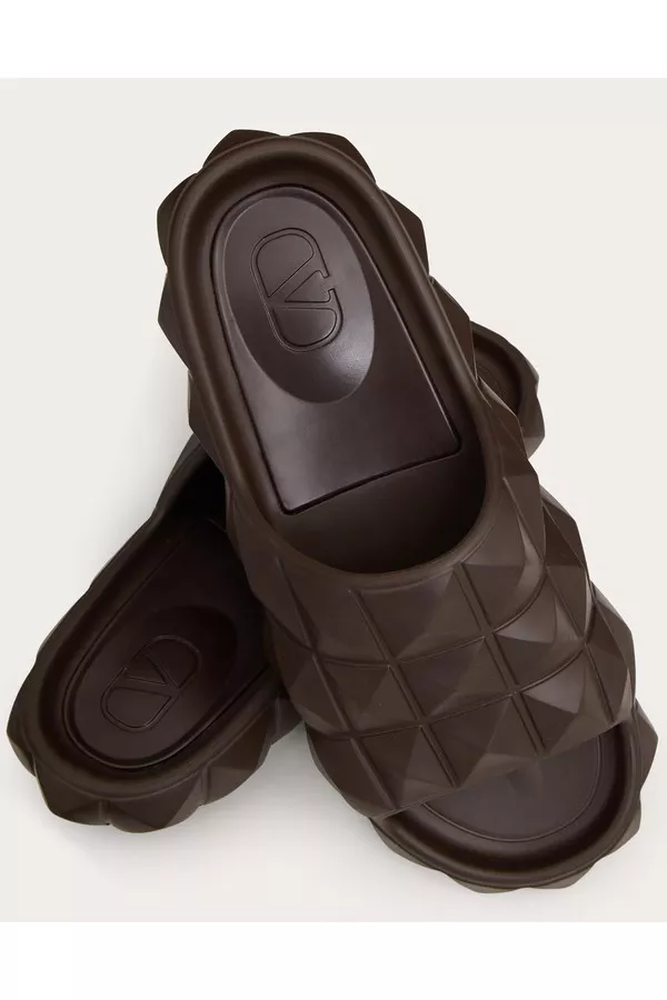 Roman Stud Turtle Slide Sandal In Rubber by Valentino