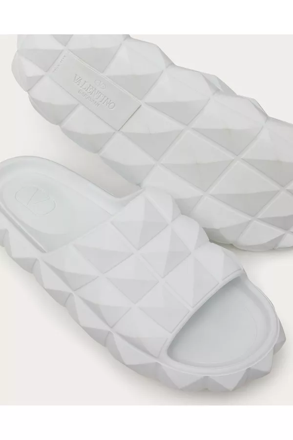 Roman Stud Turtle Slide Sandal In Rubber by Valentino